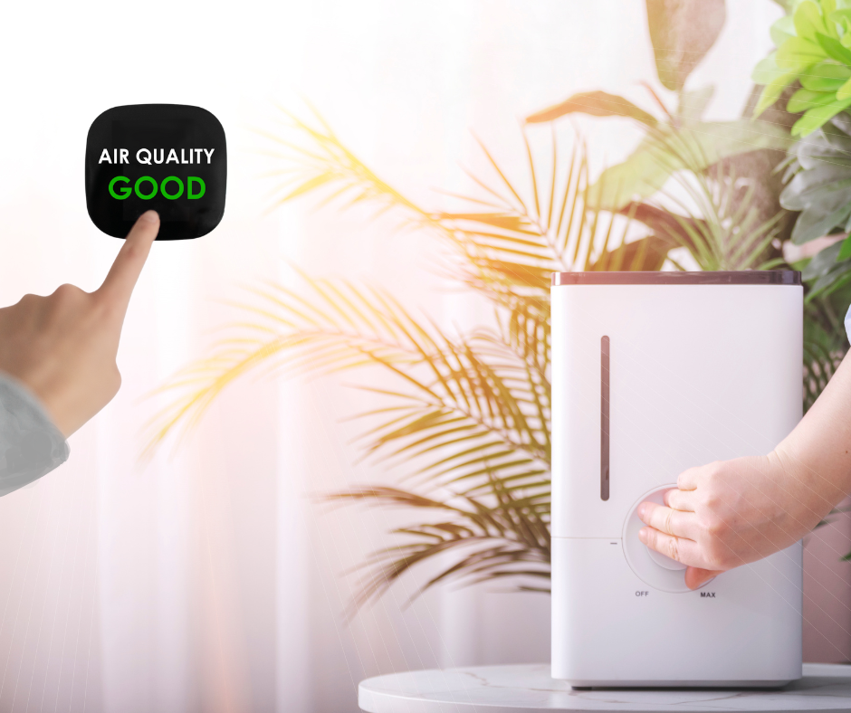 A person adjusts an indoor air purifier while another person measures air quality.